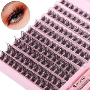 Macro detail of individual cluster eyelashes set with bonding glue and application tool