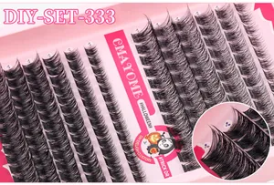 Detail of DIY individual lash clusters showing thick D-curl fibers on festive tray