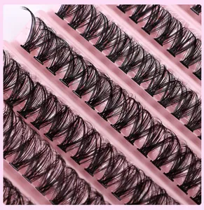 Detail view of 40D-100D individual eyelash clusters in pink tray for DIY extensions