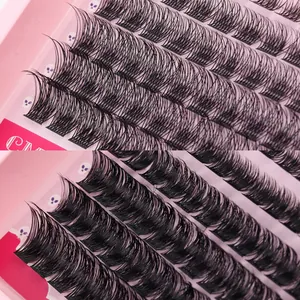 Dramatic D-curl individual cluster lashes with dense volume on pink skull design card