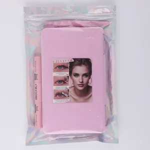 Close-up of pink lash bond and seal with packaging featuring biotin and vitamin E