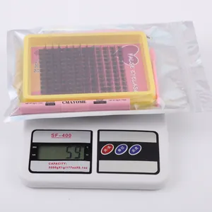 DIY eyelash extension kit featuring 240 clusters, dual-ended bond, seal and pink brush