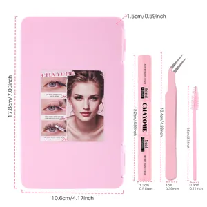 Pink DIY eyelash extension kit with glue, tweezers, and brush in a mirrored storage box