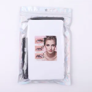 DIY eyelash extension kit with Bond & Seal glue, spoolie brush, and holographic pouch