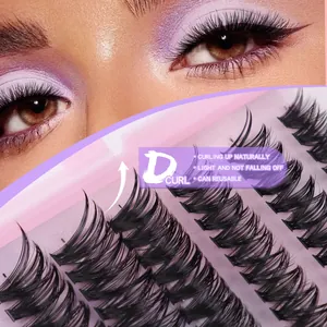 Macro detail of D-curl individual cluster lashes showing natural volume and curve