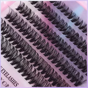 Close-up of DIY cluster eyelashes with long curly volume on a purple backing
