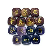 Detailed set of engraved chakra energy stones in various natural semi-precious gems