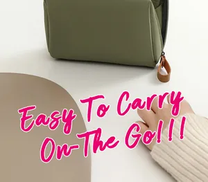 Grass green nylon makeup bag with brown leather zipper pull, easy to carry on the go