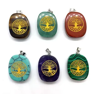 Natural crystal Tree of Life oval pendants in various gemstones with gold etching