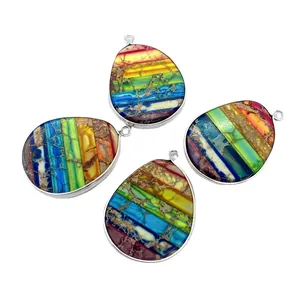 Rainbow emperor stone pendants in teardrop and oval shapes with silver metal bails