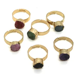 Set of six adjustable gold rings featuring 10mm round colorful natural stone inlays