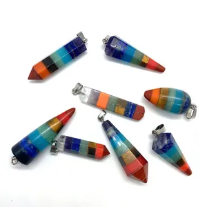Various shapes of seven chakra energy pendants featuring vibrant tiered natural stones