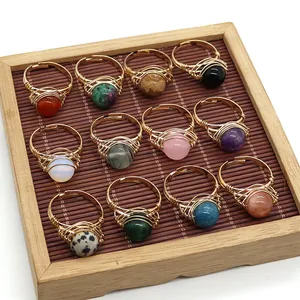 Set of 12 handmade wire wrapped natural gemstone rings with adjustable gold bands