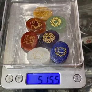 Detailed weight measurement showing seven chakra stones in a set on a digital scale