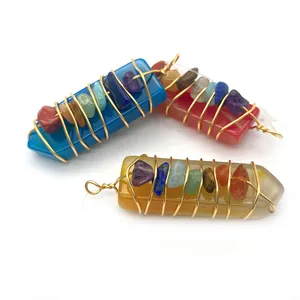 Pendentifs chakra en cristal naturel enveloppés de fil d'or rose faits à la main
