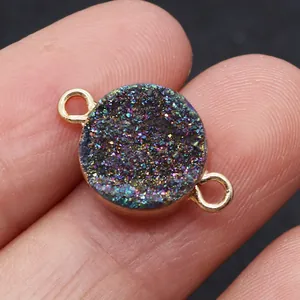 Detailed macro view of colorful druzy stone connector with gold plating for DIY jewelry