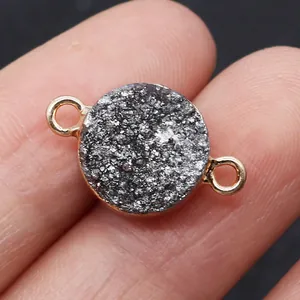 Macro shot of circular druzy quartz connector with gold plating for DIY jewelry making
