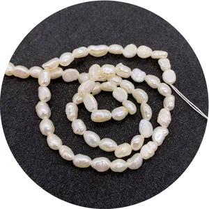 Spiral arrangement of high-luster natural white baroque freshwater pearls for jewelry DIY