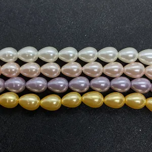 Perles gouttes en nacre blanche, rose, violette et dorée pour création de bijoux