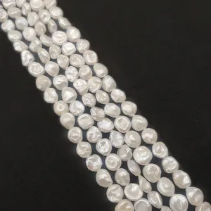 Perles d'eau douce baroques naturelles blanc crème pour bijoux DIY sur velours noir