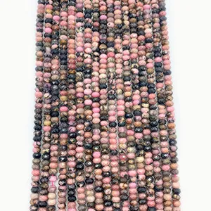 Close-up of faceted natural rhodonite stone beads for DIY jewelry necklace making