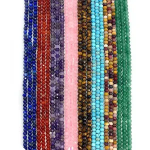Macro detail of faceted natural stone beads including lapis lazuli and tiger eye for DIY jewelry