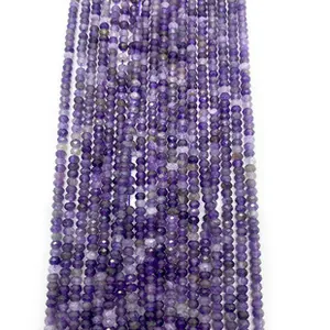 Macro detail of faceted purple natural stone beads for DIY jewelry necklace making