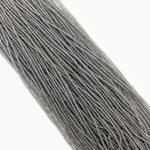 Dettaglio di perline sfaccettate in grigio occhio di gatto 2mm per gioielli fai da te