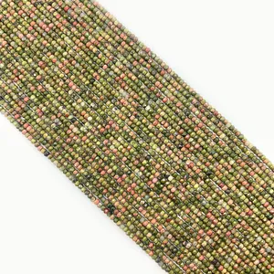 Macro shot of 2-3mm faceted Unakite stone beads for DIY jewelry making