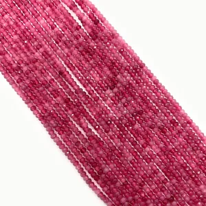 Macro view of magenta faceted natural stone beads for DIY jewelry necklace making