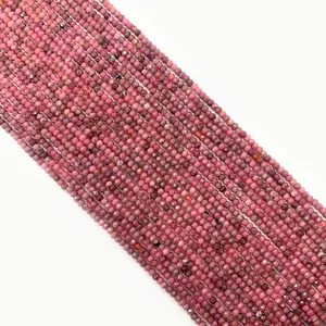 Close-up of pink faceted natural stone beads for DIY jewelry making and necklace crafts