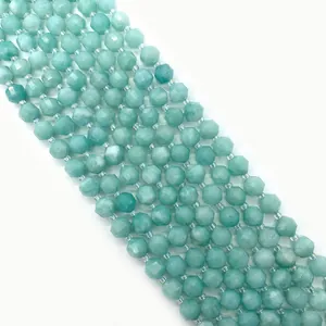 Macro shot of faceted light green natural stone beads for DIY jewelry making