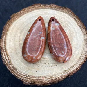 Par de colgantes de piedra natural en forma de gota con textura veteada marrón