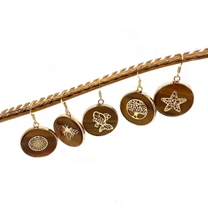 5-piece set of natural tiger eye drop earrings with gold tree of life and bee charms