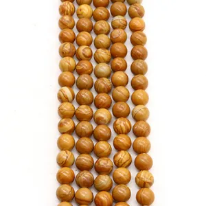Macro detail of polished natural picture jasper stone beads for DIY jewelry making
