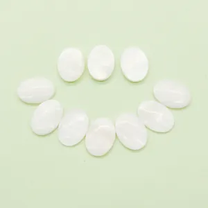 Ten pieces of oval white mother-of-pearl shell cabochons for DIY jewelry making
