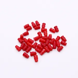 Close-up of vibrant red gourd-shaped synthetic coral beads for DIY jewelry making