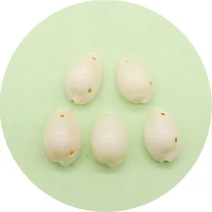 Set of five oval natural white shell pendants with pre-drilled holes for DIY jewelry