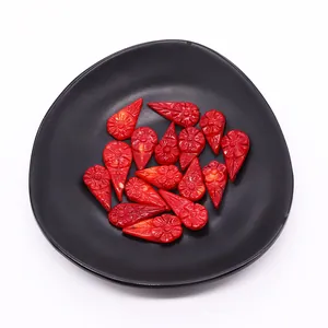 Red carved drop-shaped synthetic coral beads with floral patterns for DIY jewelry making