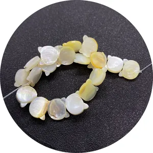 Natural yellow shell owl beads with iridescent luster for DIY jewelry making