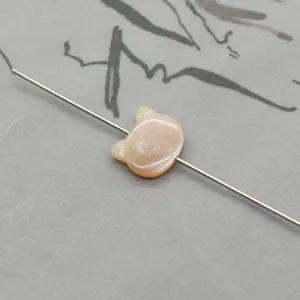 Cat-shaped pink mother of pearl shell bead with through-hole for DIY jewelry making