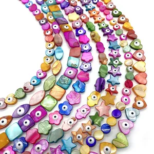 Colorful natural shell beads in heart, flower and hamsa shapes for DIY jewelry making