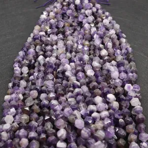 Macro view of faceted amethyst beads with natural purple textures for DIY jewelry making