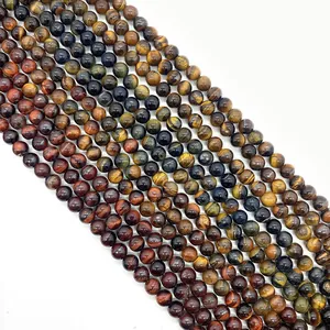 Macro detail of yellow, red and blue tiger eye stone beads for DIY jewelry making