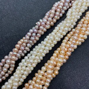 Detail of 5-7mm natural freshwater pearls in purple and white for DIY jewelry making