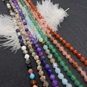 Close-up of faceted natural stone beads in various colors for DIY jewelry making