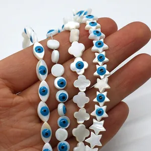 Perles en nacre naturelle en forme d'étoile et trèfle avec motifs d'œil bleu maléfique