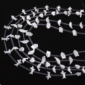 Perline di madreperla bianca a forma di animale per la creazione di gioielli e collane