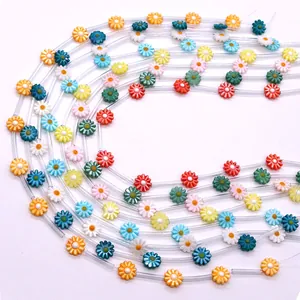 Handmade necklace with natural shell daisy flower beads and colorful acrylic tubes