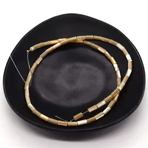Perles cylindriques en nacre naturelle pour création de colliers artisanaux